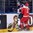 MINSK, BELARUS - MAY 20: Denmark's Patrick Bjorkstrand #11 hits Slovakia's Karol Sloboda #22 into the boards during preliminary round action at the 2014 IIHF Ice Hockey World Championship. (Photo by Richard Wolowicz/HHOF-IIHF Images)


